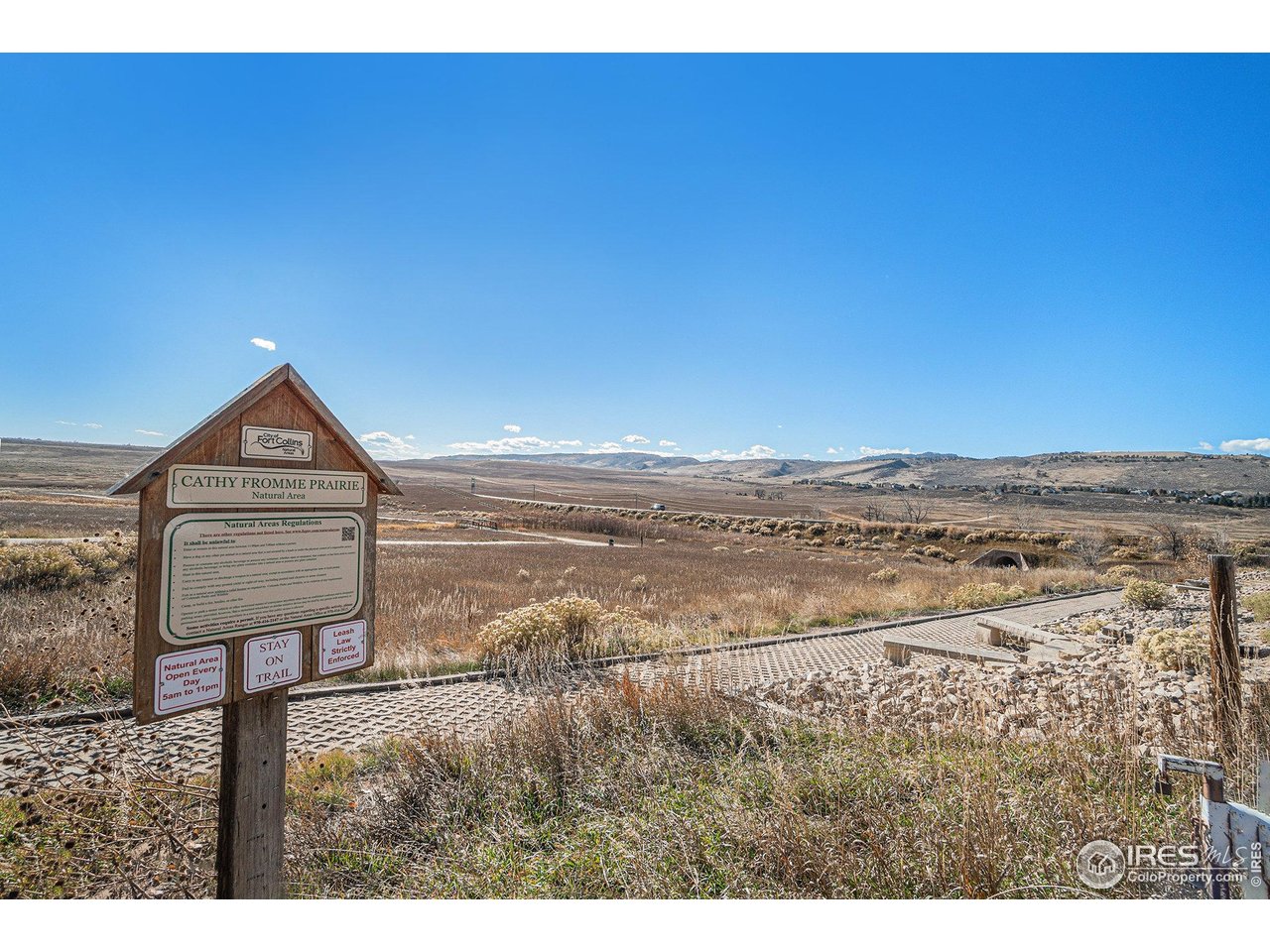 1827 Fromme Prairie Way Fort Collins, CO 80526 - Photo 21 of 21 a view of a room with wooden floor