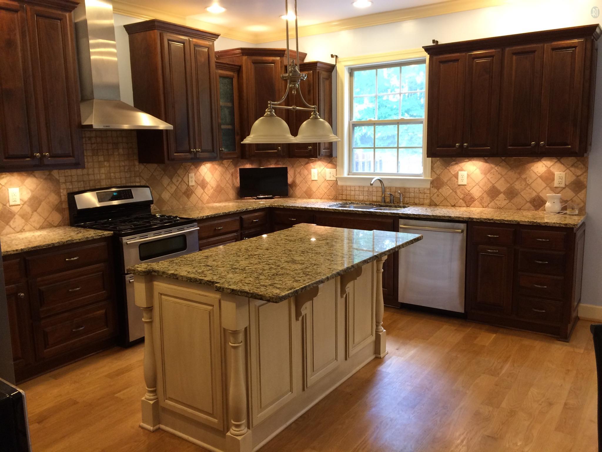 1037 Rock Church Road Dickson, TN 37055 - Photo 4 of 15 This kitchen is culinary delight. Custom walnut cabinetry, granite, SS appliances, counter-top and recessed lighting, will make this your dream kitchen!