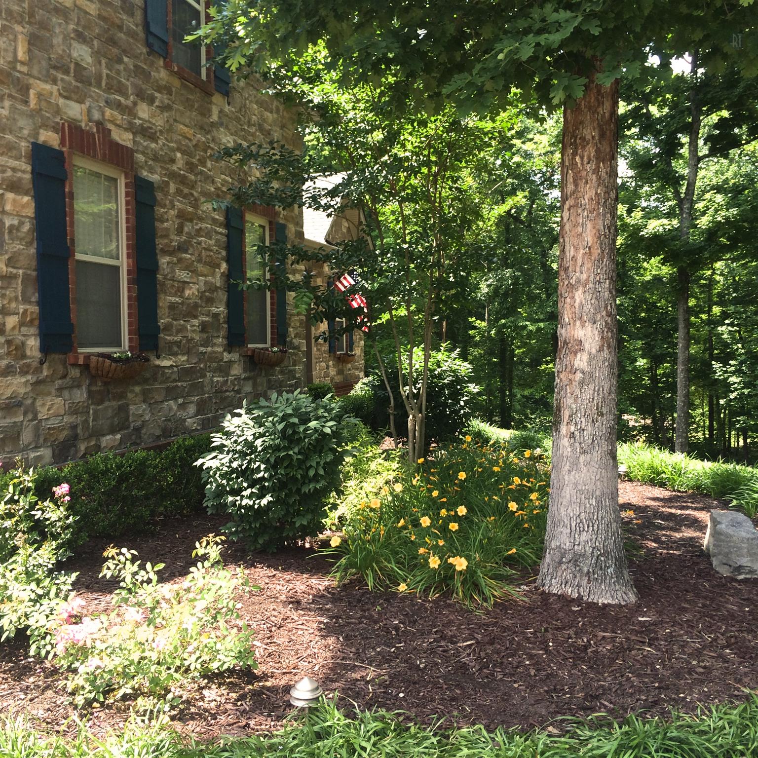1037 Rock Church Road Dickson, TN 37055 - Photo 9 of 15 One of many beautiful flower beds on property!