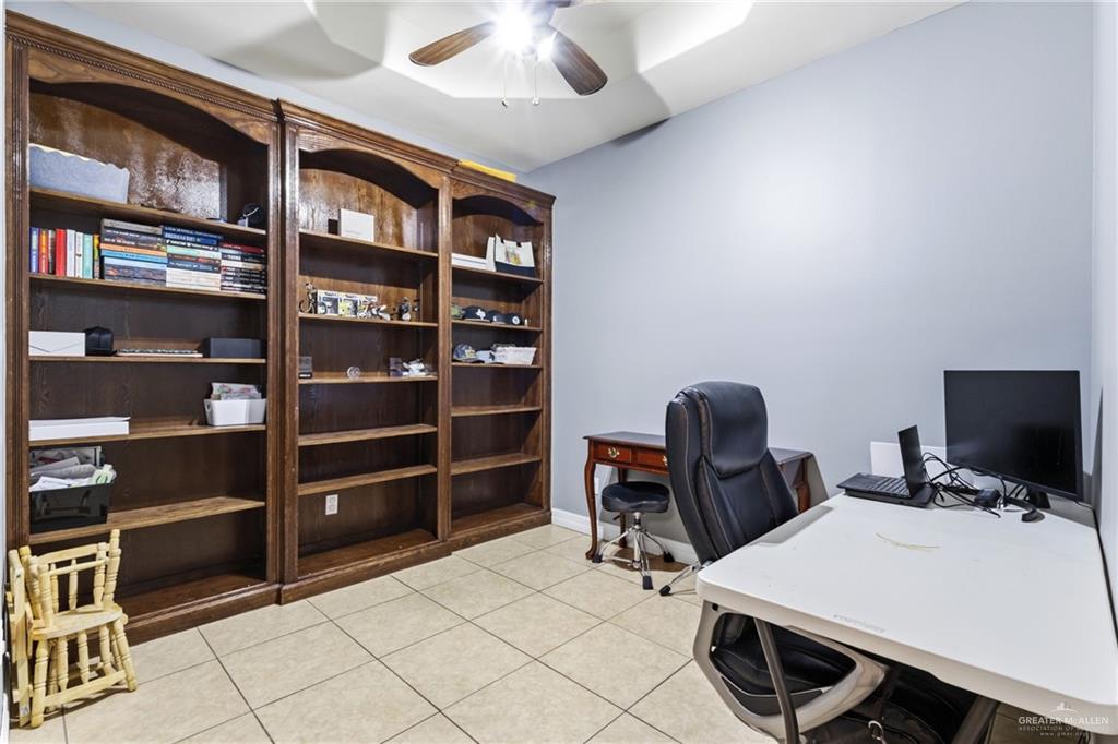 22602 Rio Rancho Road Harlingen, TX 78552 - Photo 16 of 26 a view of a workspace with furniture