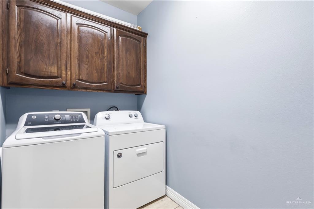 22602 Rio Rancho Road Harlingen, TX 78552 - Photo 17 of 26 a utility room with dryer and washer