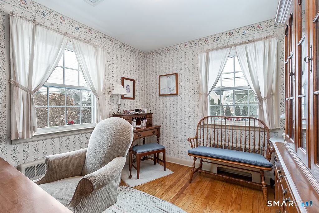 13 Dock Road Milford, CT 06460 - Photo 11 of 18 a living room with furniture and a window