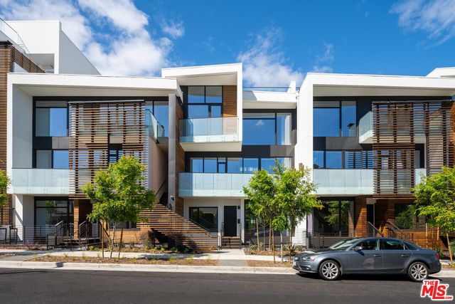 a car parked in front of a building