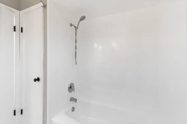 a bathroom with a bathtub