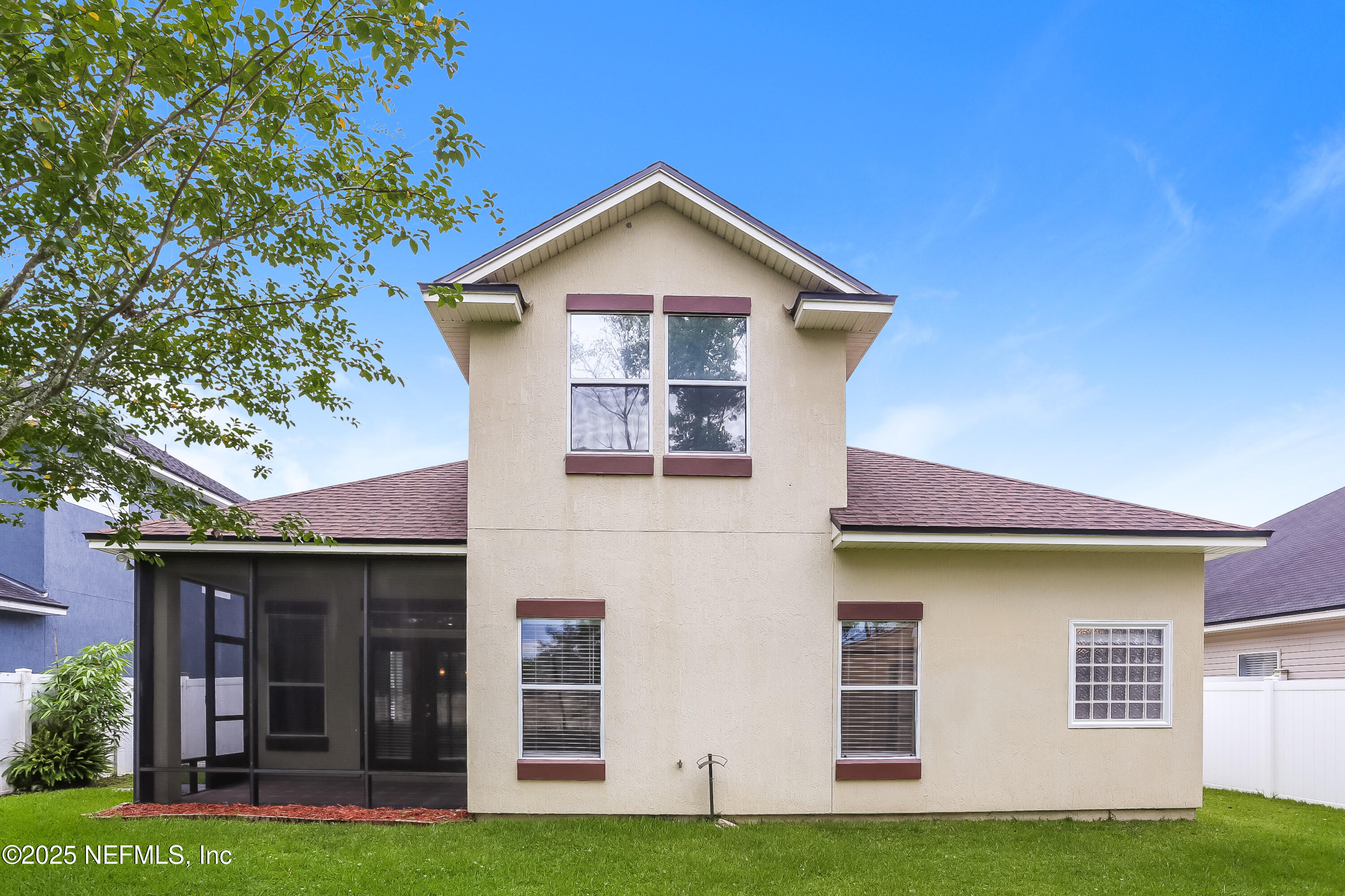 15808 Spotted Saddle Circle Jacksonville, FL 32218 - Photo 18 of 18 a front view of a house with a yard and garage
