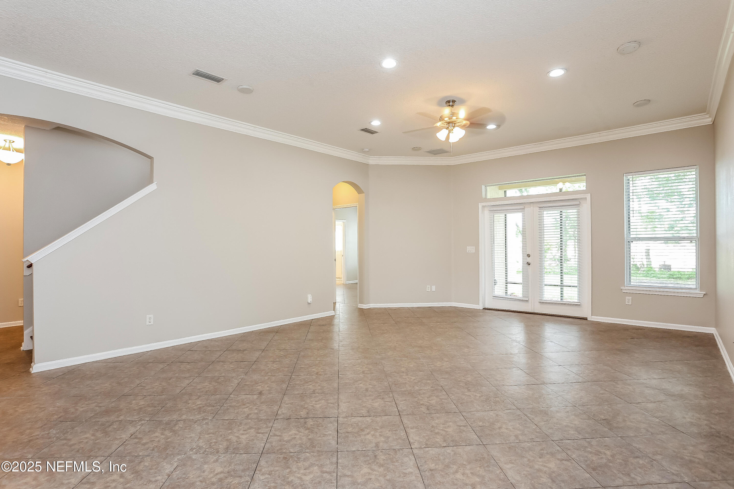15808 Spotted Saddle Circle Jacksonville, FL 32218 - Photo 6 of 18 a view of an empty room with a window