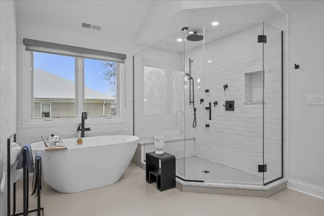 a view of a livingroom with furniture and windows