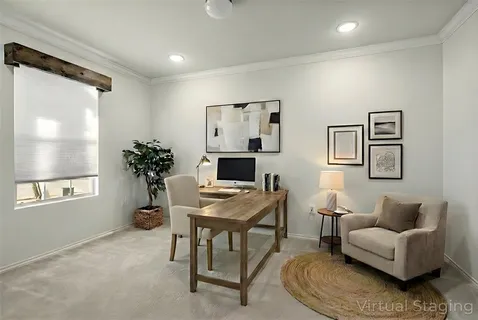 a workspace with furniture and window