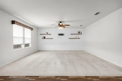 a view of a livingroom with a window