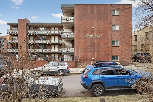 a car parked in front of a building