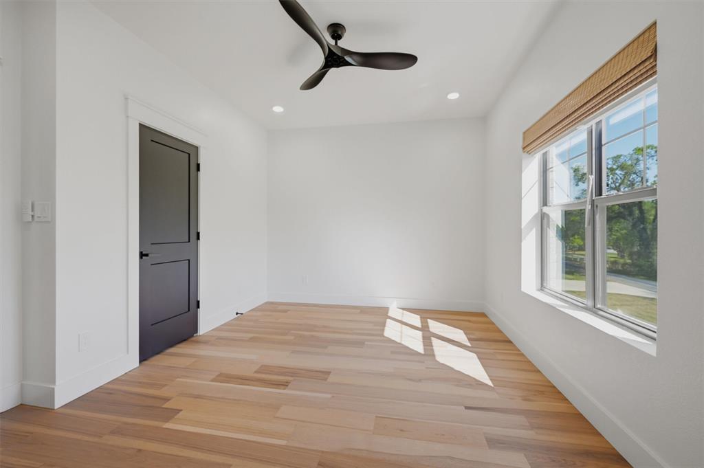 1805 Arthur Road Denison, TX 75021 - Photo 32 of 40 a bedroom with a bed and a window