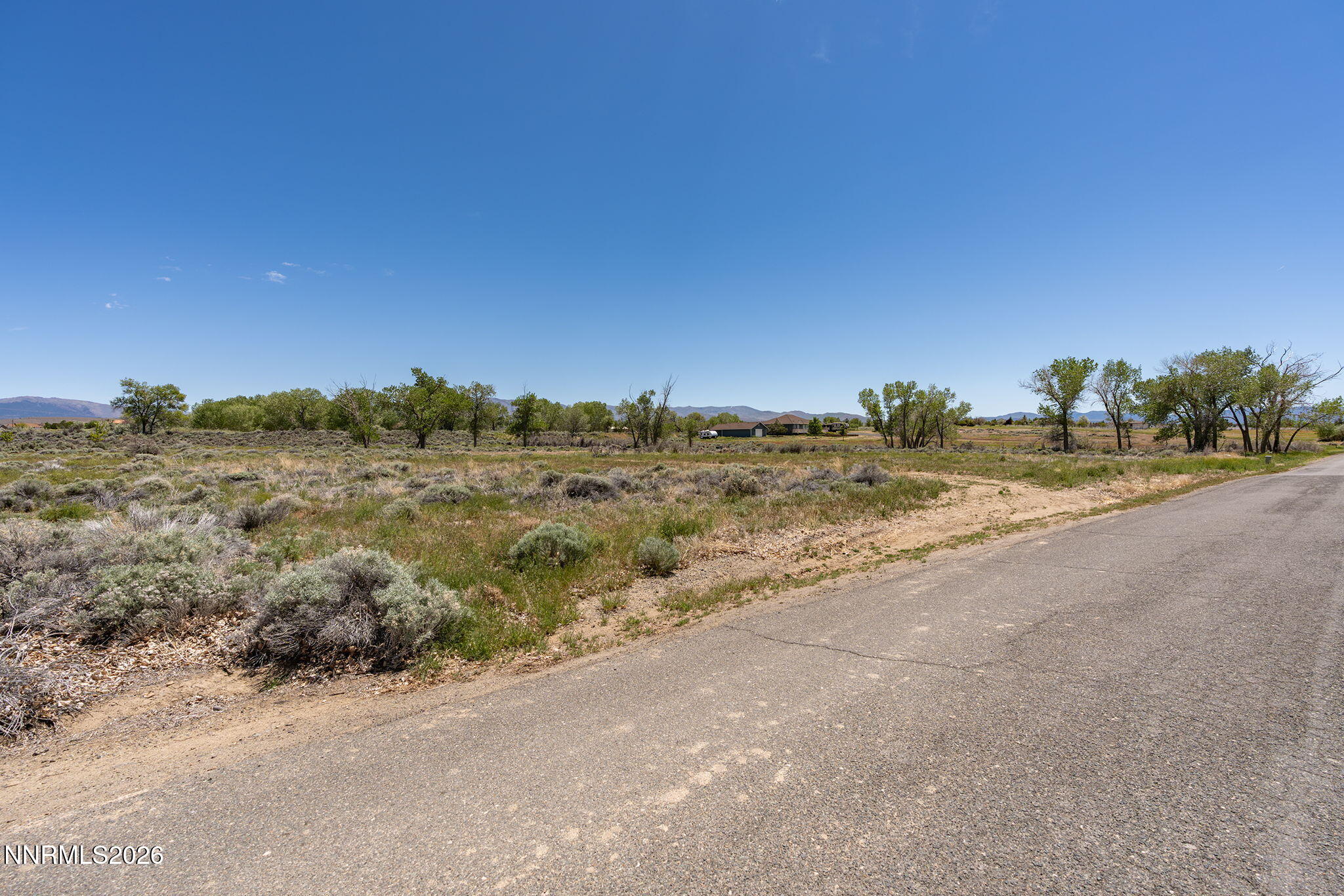1655 Lombardy Road Gardnerville, NV 89410 - Photo 5 of 12 a view of a beach with a building in the background