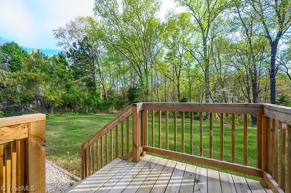 722 Broadway Road Lexington, NC 27295 - Photo 22 of 25 Private back yard is surrounded by lovely trees and the smell of honeysuckle