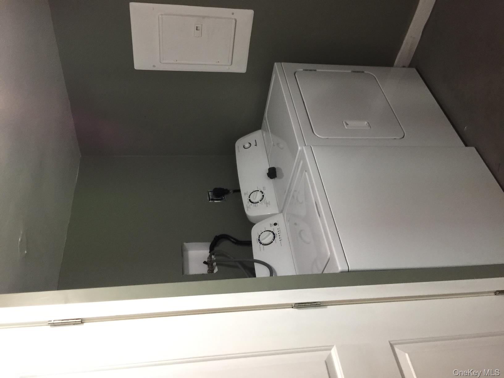 8064 Albany Post Road Red Hook, NY 12571 - Photo 21 of 21 a utility room with dryer and washer