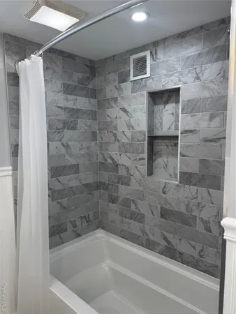 a bathroom with a bathtub