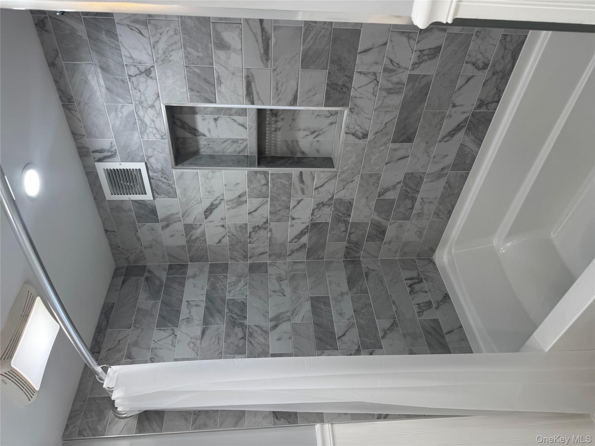 8064 Albany Post Road Red Hook, NY 12571 - Photo 4 of 21 a bathroom with a bathtub