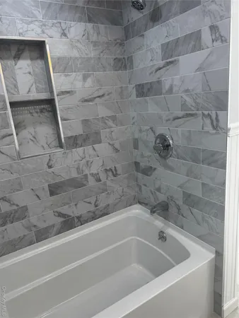 a bathroom with a bathtub