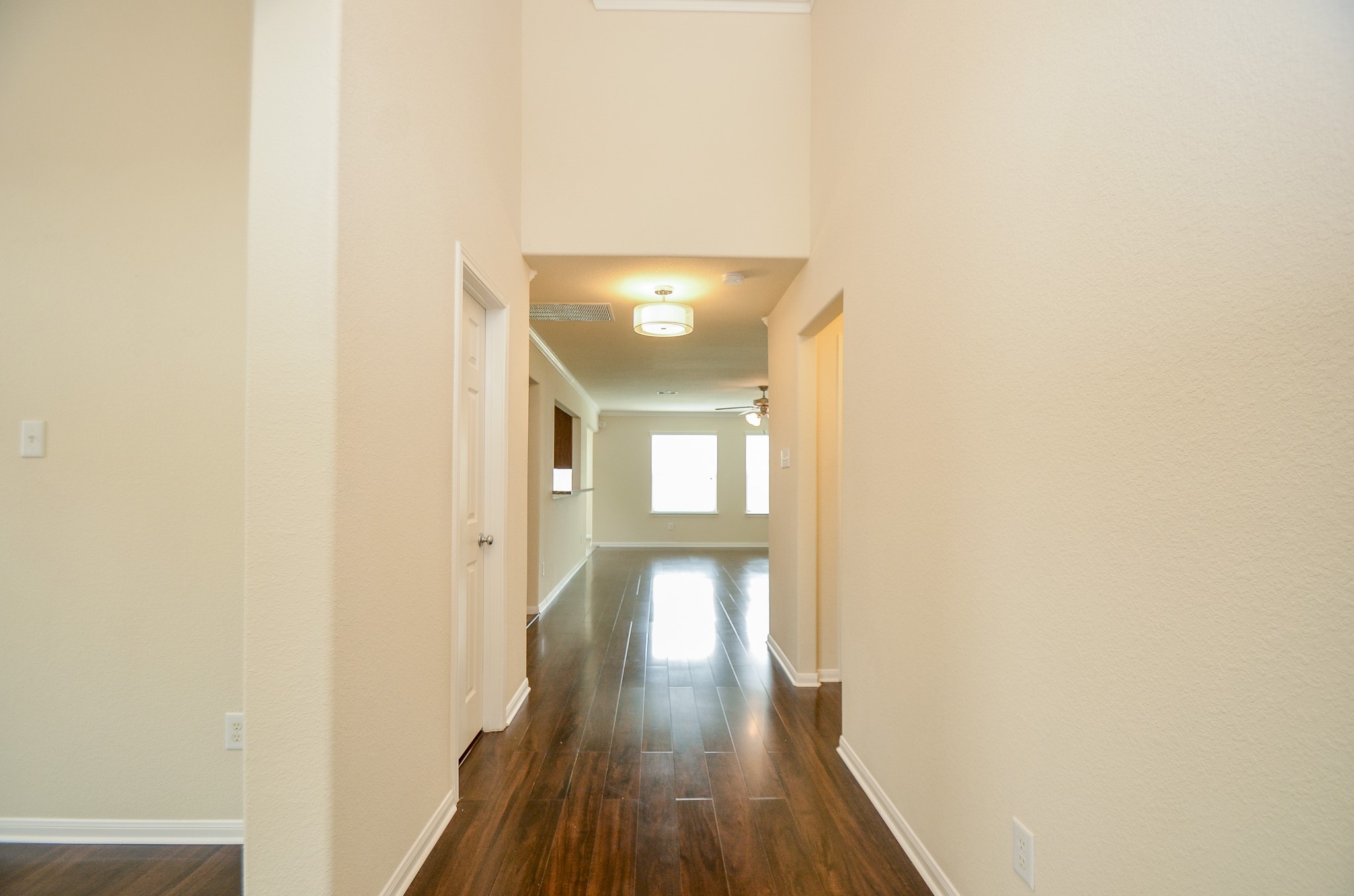 2903 Gaelic Green Street Houston, TX 77045 - Photo 10 of 32 a view of a hallway with wooden floor