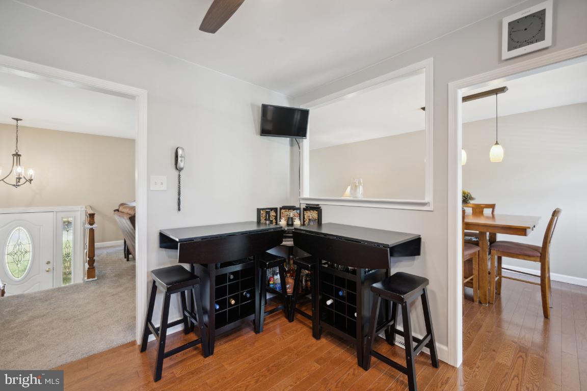 1 Saddle Ridge Road Voorhees, NJ 08043 - Photo 8 of 29 a view of a dining room with furniture and wooden floor