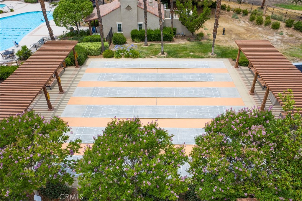 215 Firestone Lane Hemet, CA 92545 - Photo 47 of 61 a front view of a house with a yard and potted plants