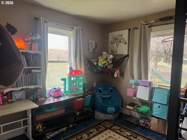 a room with furniture and window