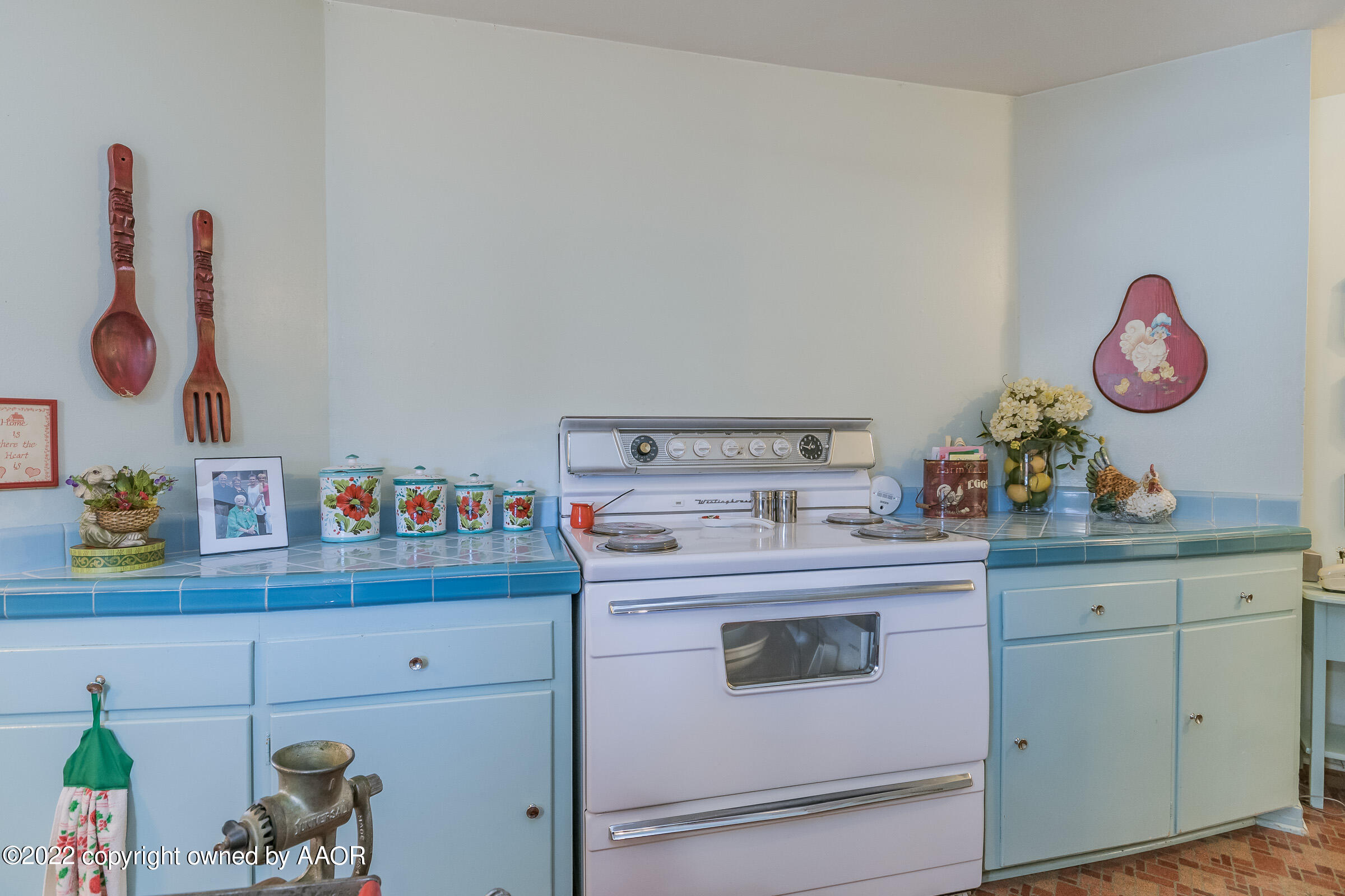 1538 Bell Street Amarillo, TX 79106 - Photo 12 of 26 a view of cabinets a washer and dryer