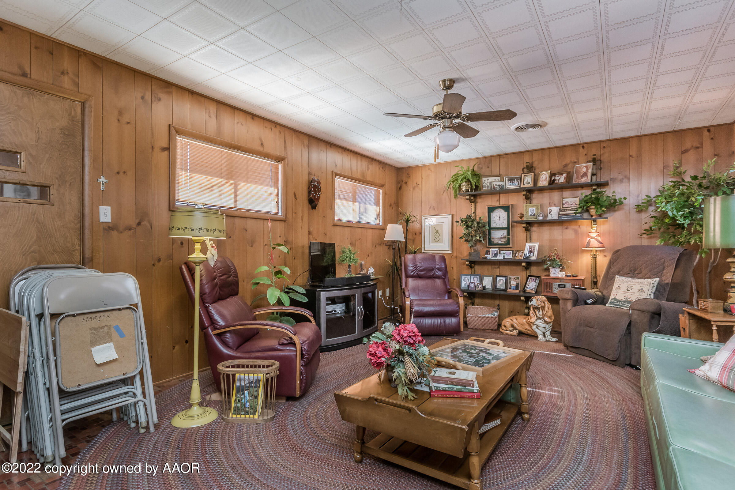 1538 Bell Street Amarillo, TX 79106 - Photo 15 of 26 a living room with furniture and a flat screen tv