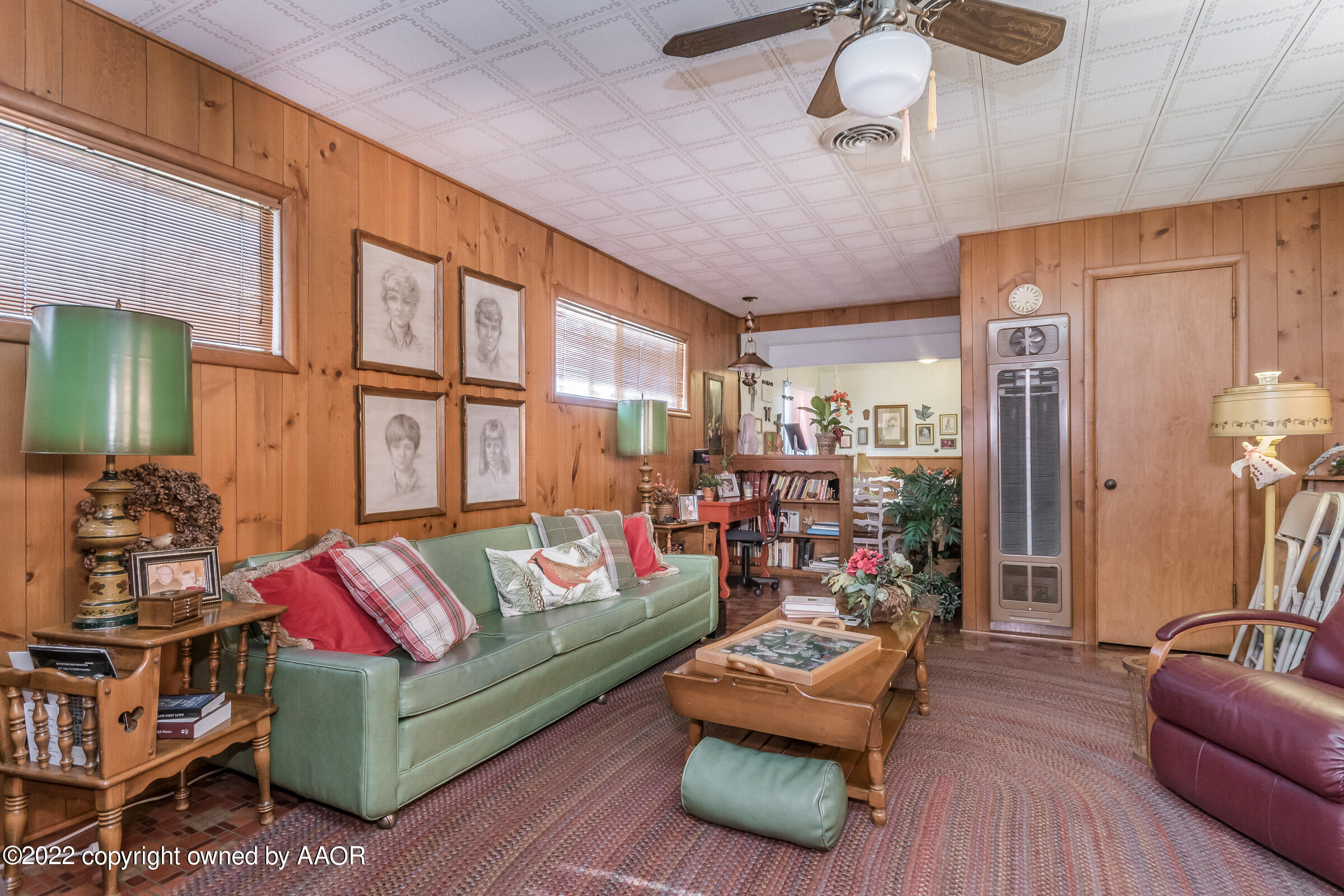 1538 Bell Street Amarillo, TX 79106 - Photo 16 of 26 a living room with furniture and a flat screen tv