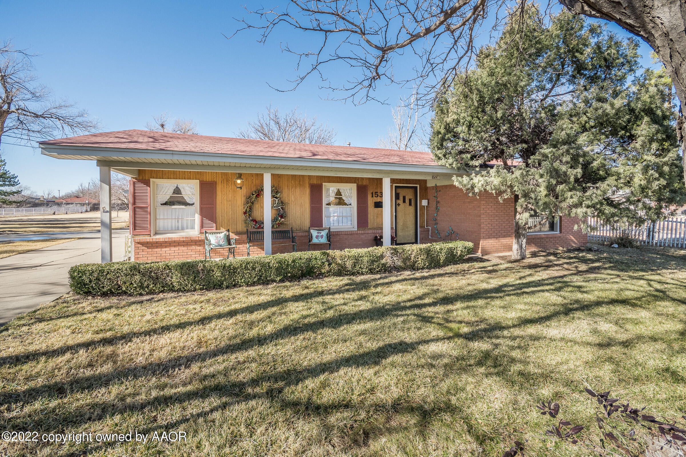 1538 Bell Street Amarillo, TX 79106 - Photo 3 of 26 a front view of a house with garden
