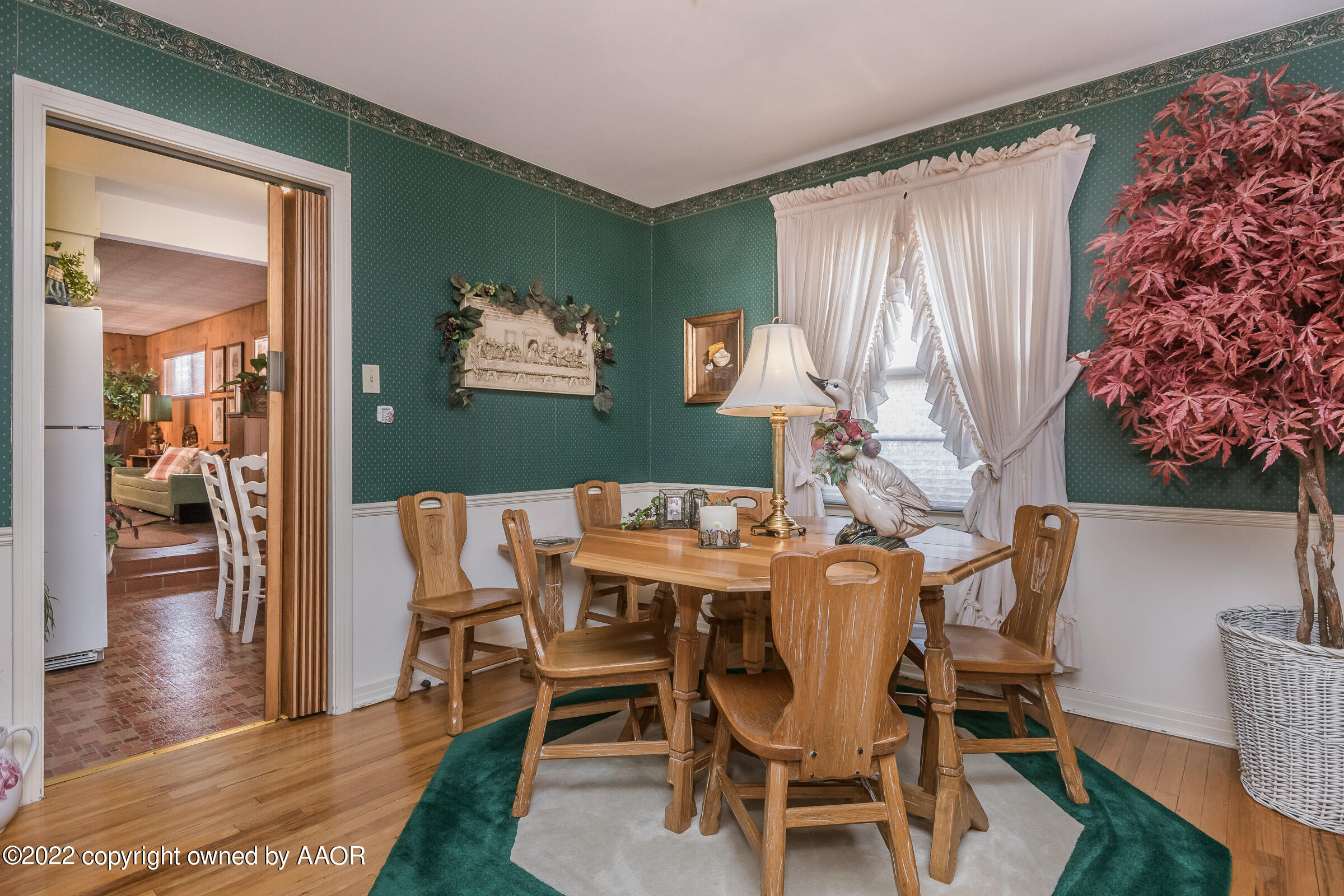 1538 Bell Street Amarillo, TX 79106 - Photo 8 of 26 a view of a dining room with furniture and wooden floor