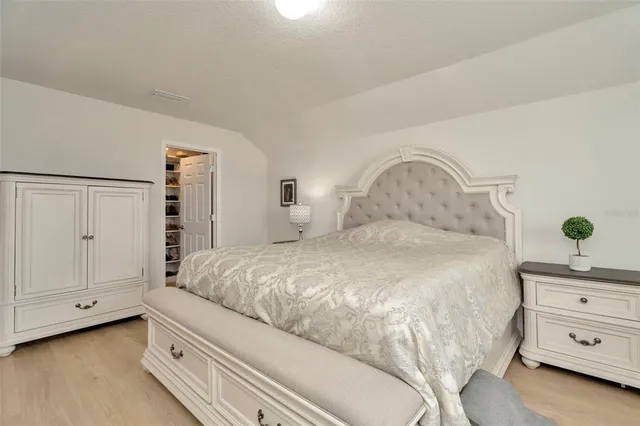 a living room with furniture and white walls