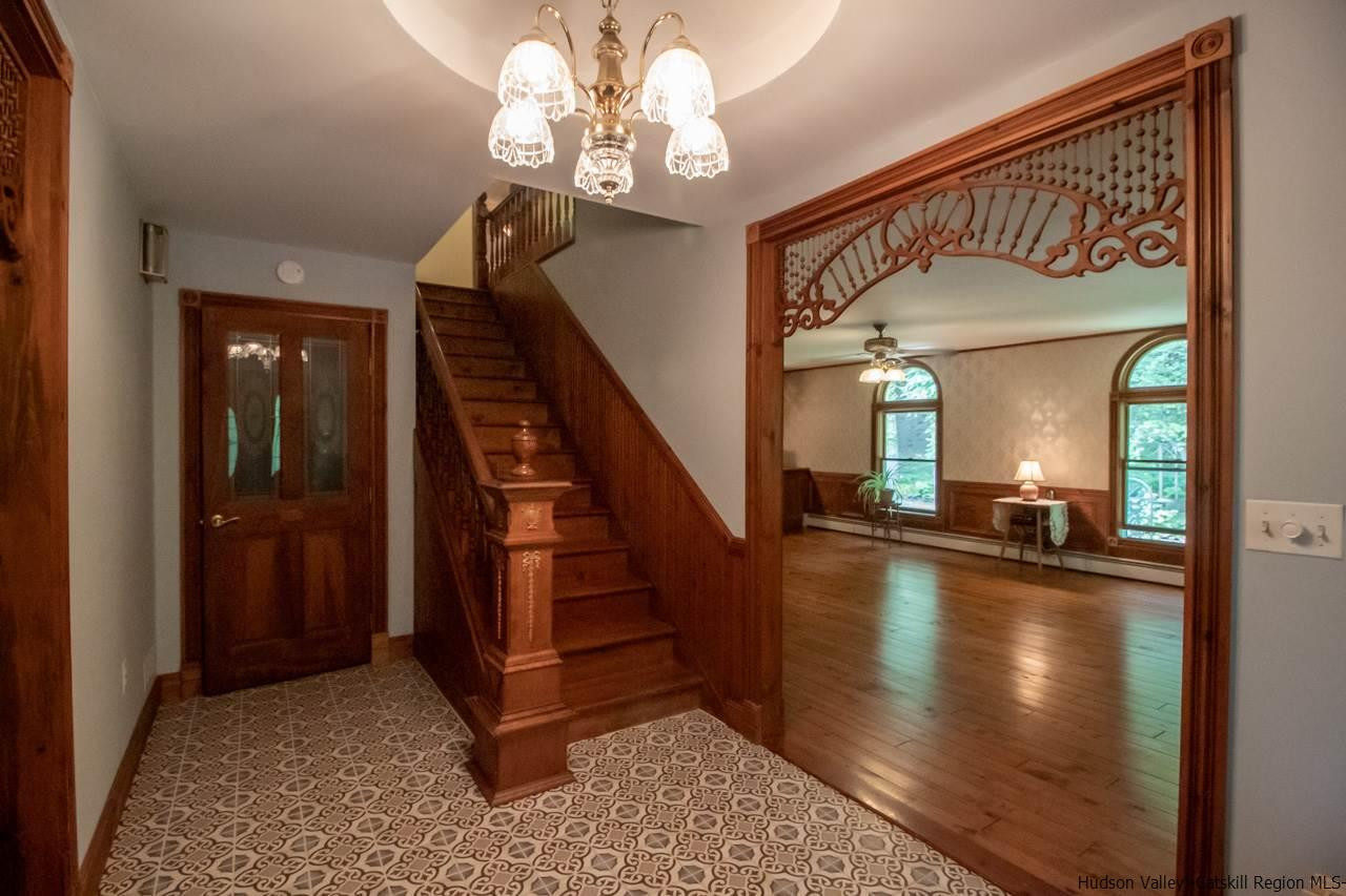 30 Peak Farm Road Stone Ridge, NY 12484 - Photo 8 of 35 a view of a livingroom kitchen wooden floor and stairs