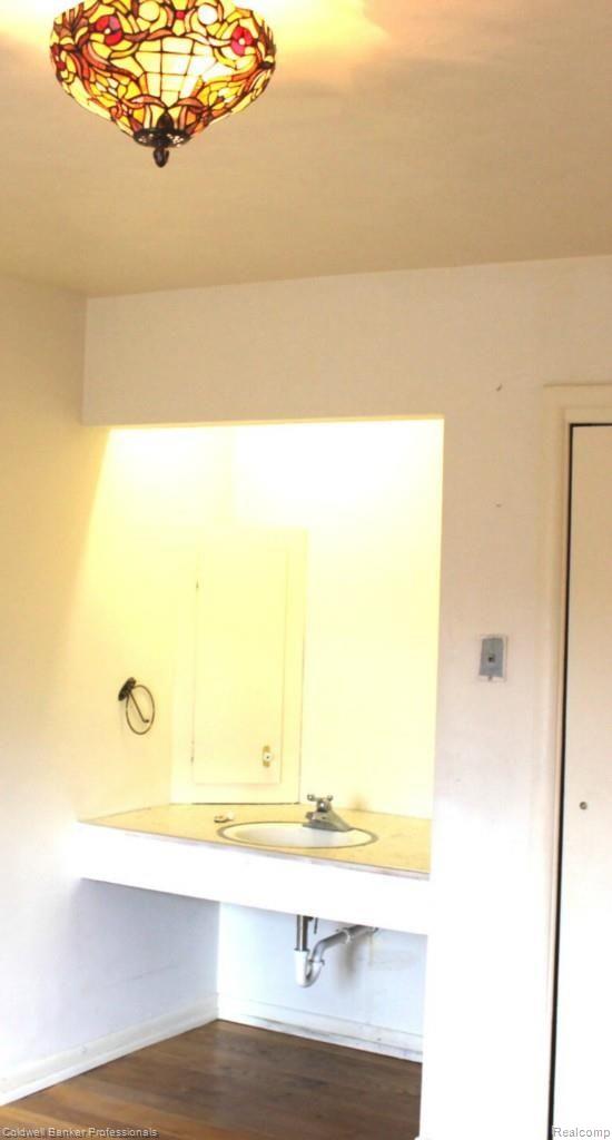2238 Haines Road Lapeer, MI 48446 - Photo 14 of 19 Bedroom with Sink; Hardwood Floors