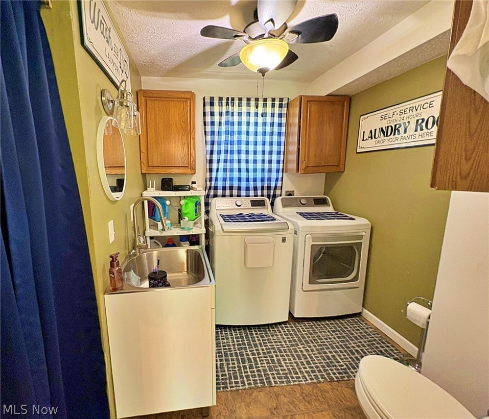 10677 Baumhart Road Amherst, OH 44001 - Photo 15 of 44 Laundry room and half-bath