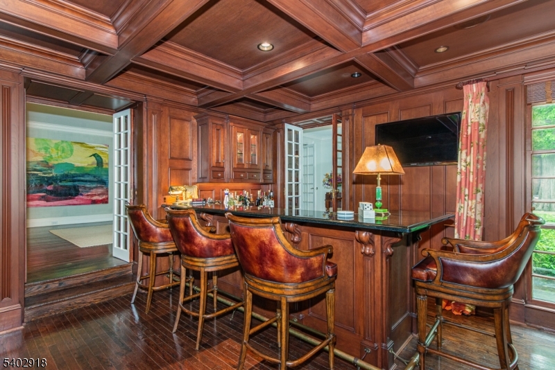 412 Ridgewood Avenue Glen Ridge, NJ 07028 - Photo 17 of 48 a dining room with furniture and wooden floor