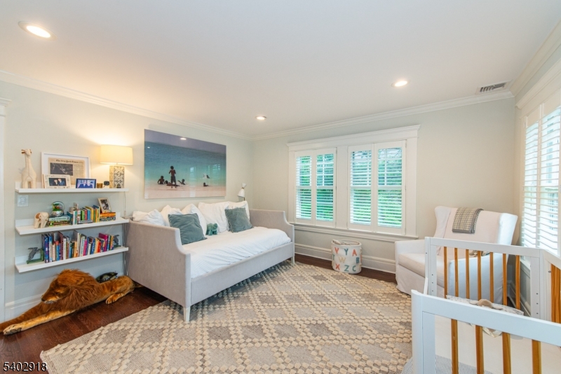 412 Ridgewood Avenue Glen Ridge, NJ 07028 - Photo 28 of 48 a living room with furniture and a window