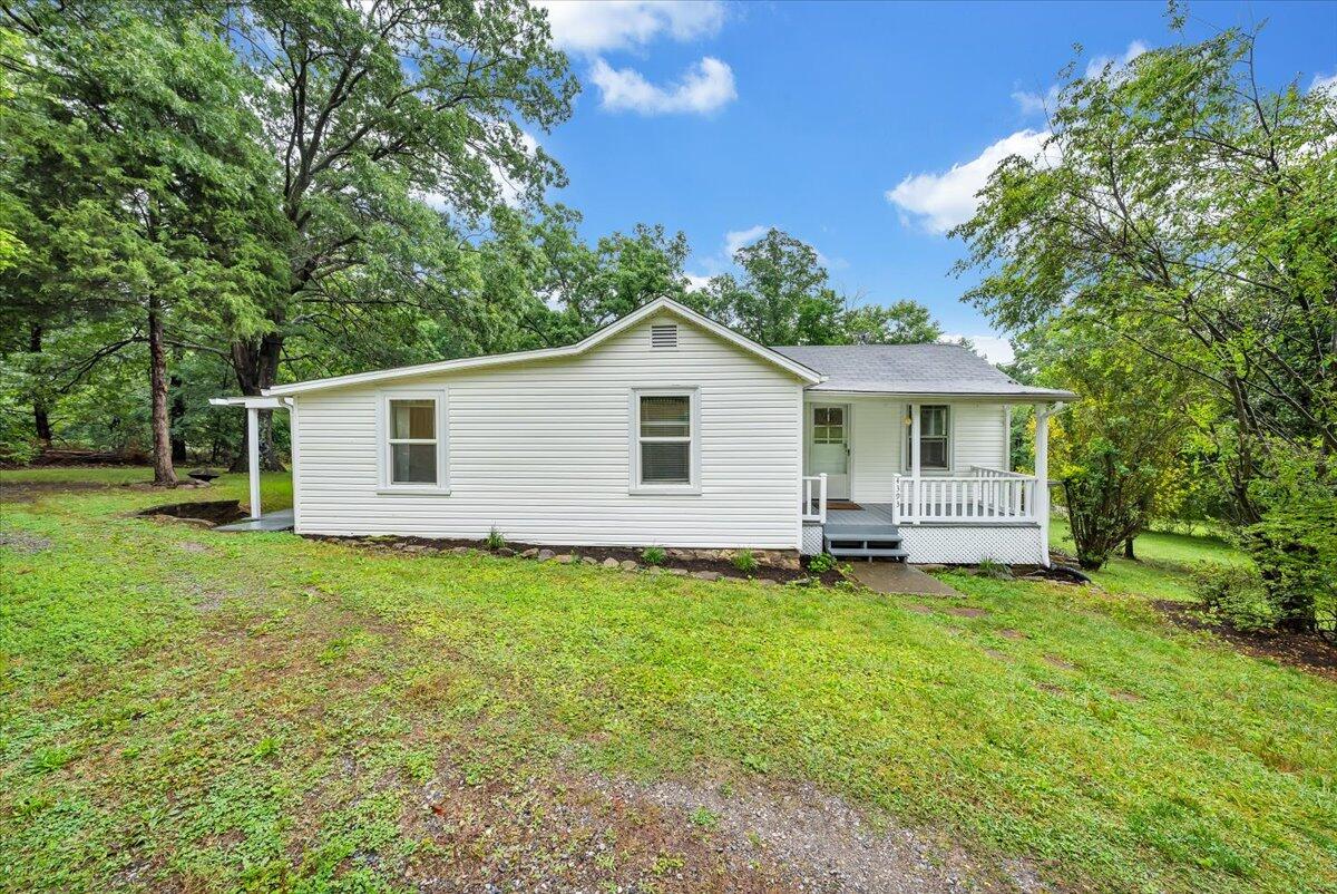4393 Daugherty Road Salem, VA 24153 - Photo 24 of 24 a view of a house with a yard and a porch