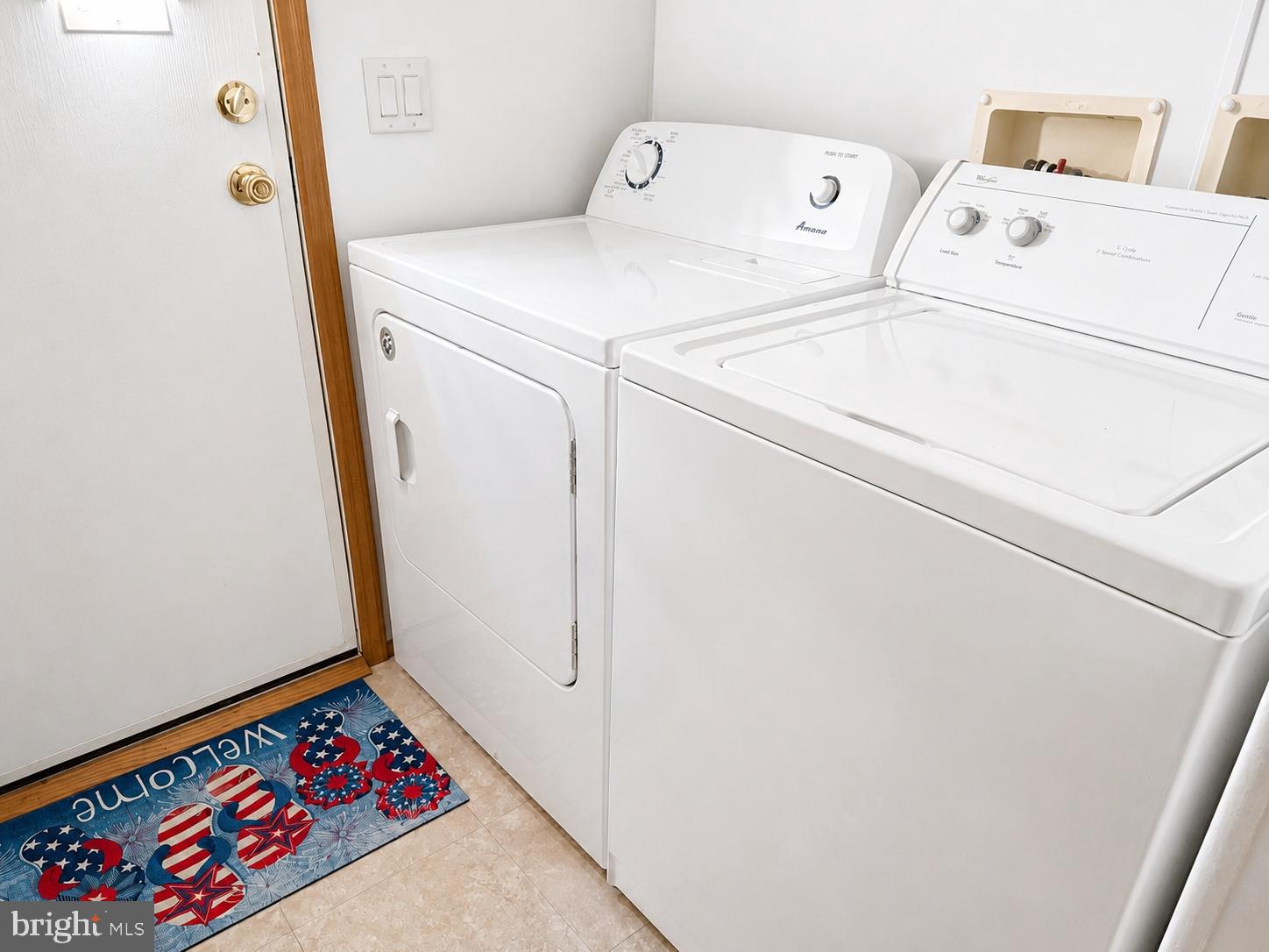 26423 Rudder Road, Unit E932 Long Neck, DE 19966 - Photo 35 of 54 laundry room
