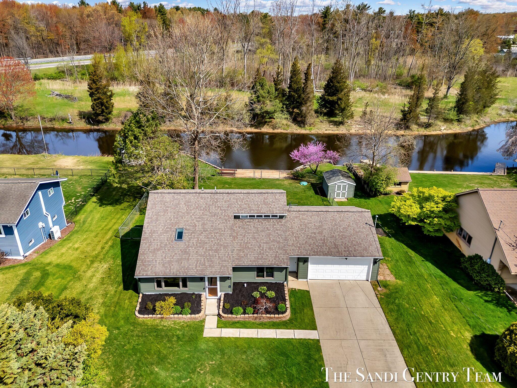 17083 Spahr Street Spring Lake, MI 49456 - Photo 3 of 49 01-DJI_20250507111740_0254_D