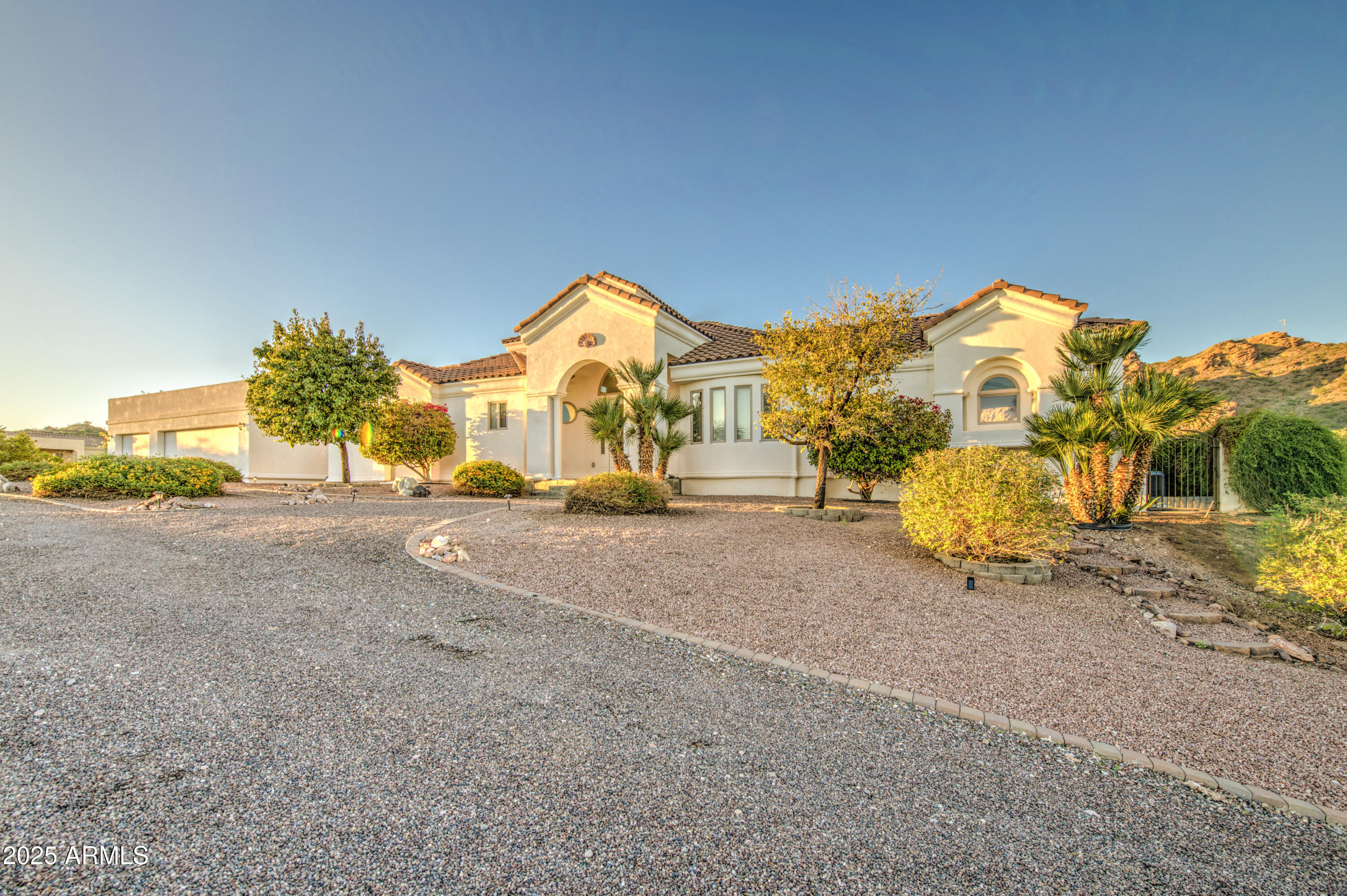 5238 North Explorer Road Apache Junction, AZ 85119 - Photo 12 of 109 a view of a house with a road