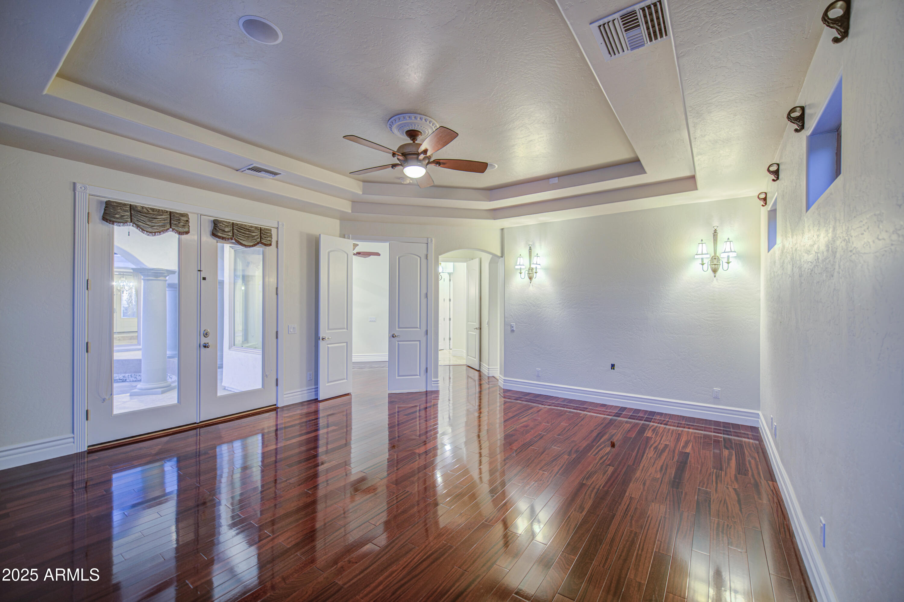 5238 North Explorer Road Apache Junction, AZ 85119 - Photo 39 of 109 a view of a hallway with wooden floor