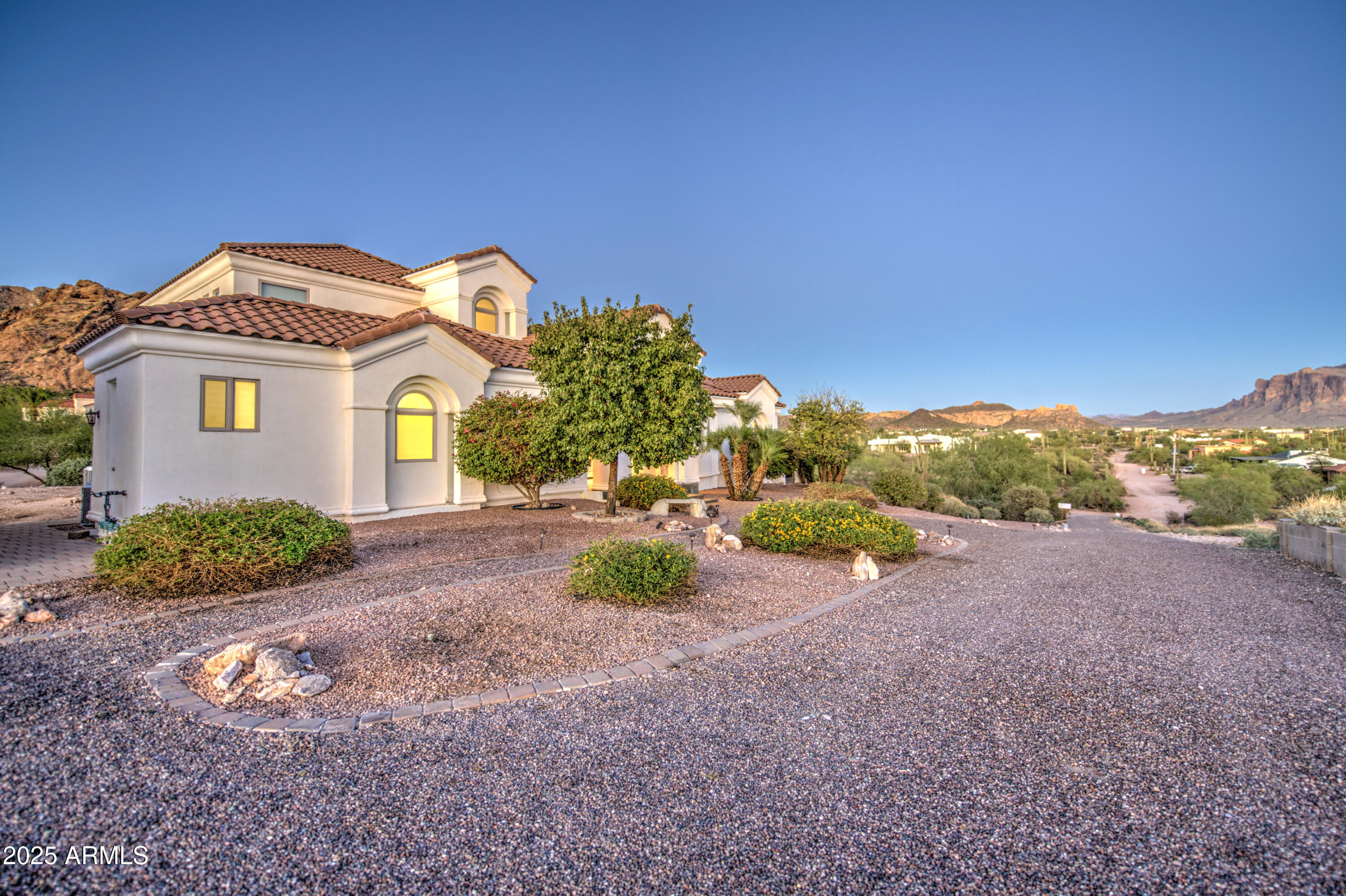 5238 North Explorer Road Apache Junction, AZ 85119 - Photo 88 of 109 a view of a house with a yard and garage