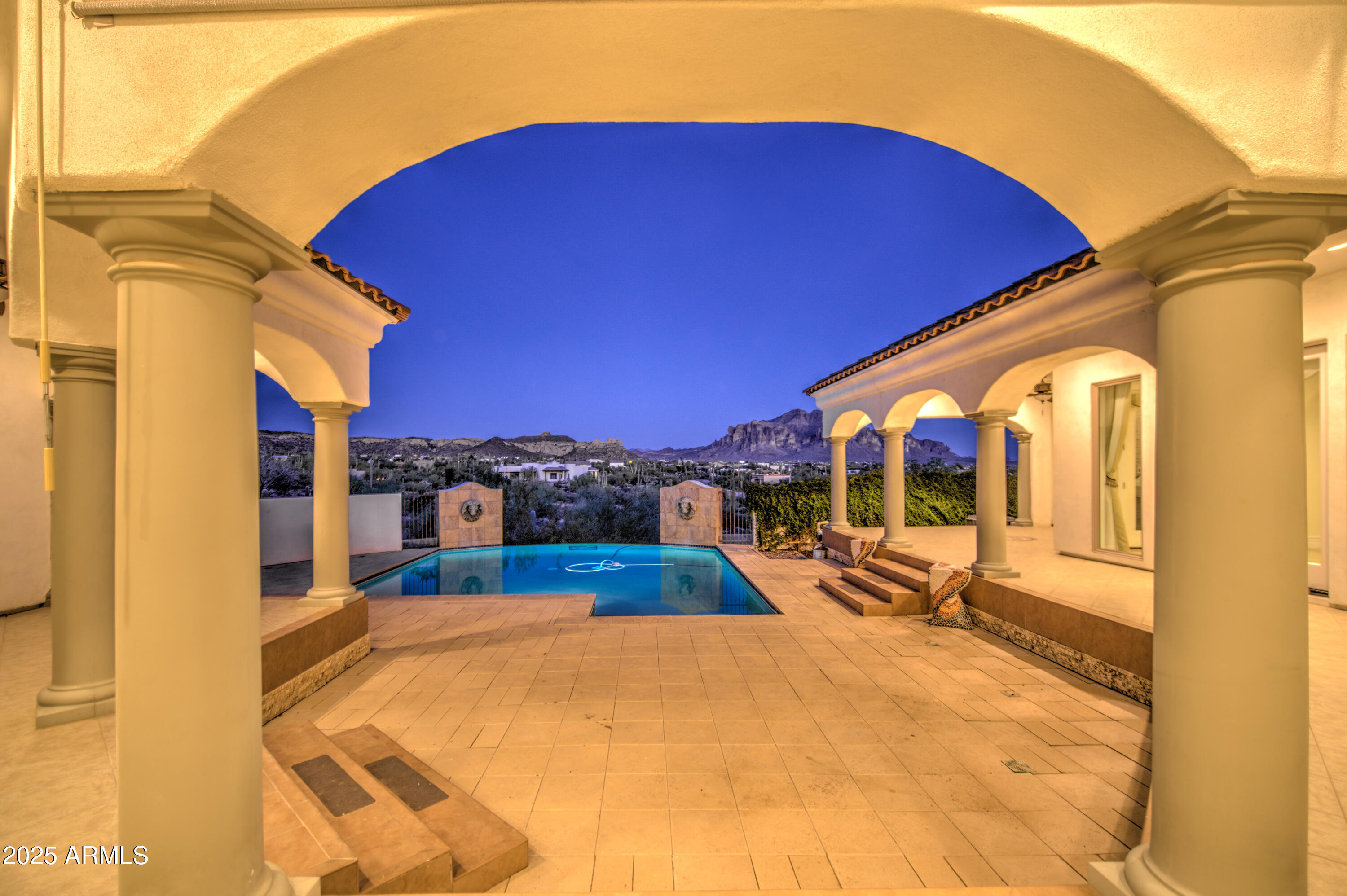 5238 North Explorer Road Apache Junction, AZ 85119 - Photo 99 of 109 a view of a swimming pool with a lounge chairs