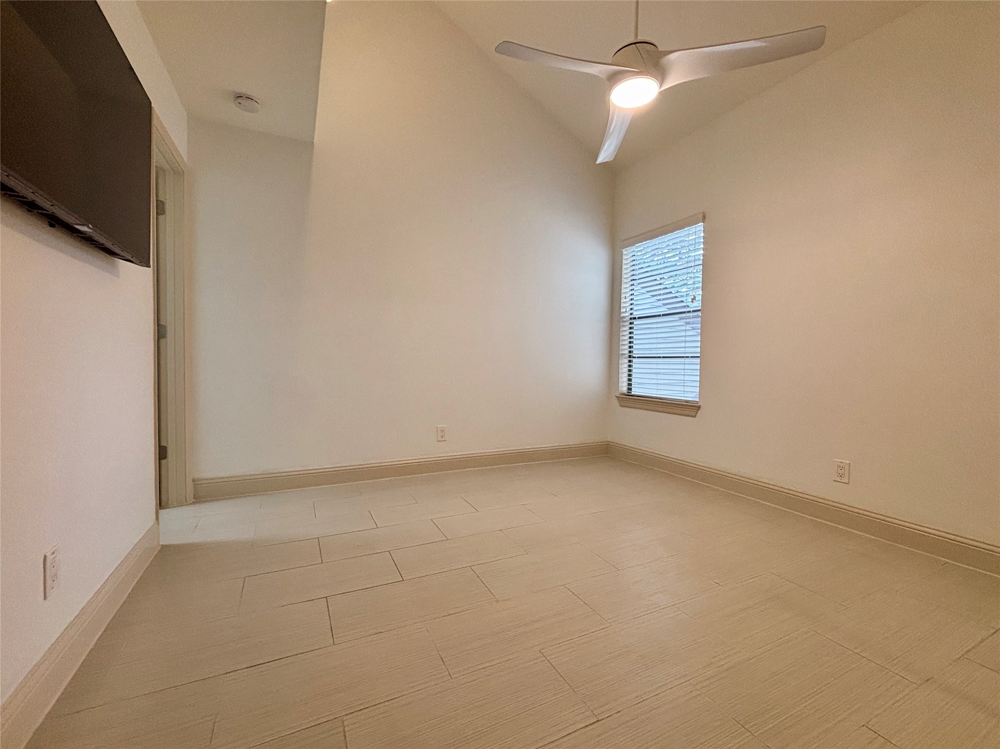 12900 Walden Road, Unit 508E Montgomery, TX 77356 - Photo 14 of 25 a view of an empty room with a window