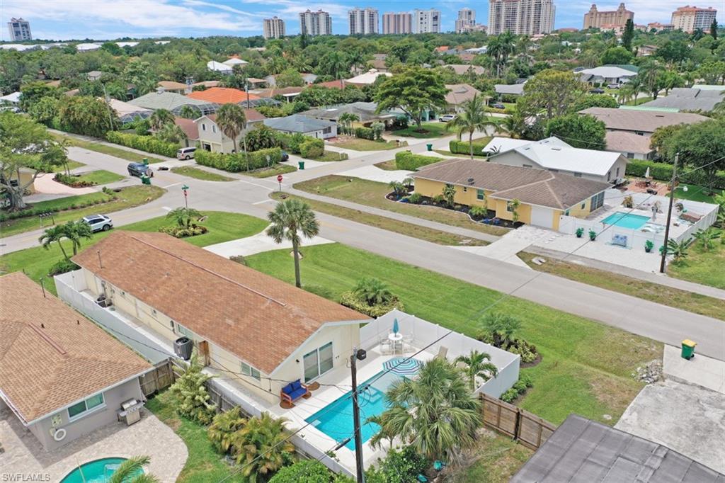 701 93rd Avenue North Naples, FL 34108 - Photo 23 of 33 an aerial view of residential houses with outdoor space and street view