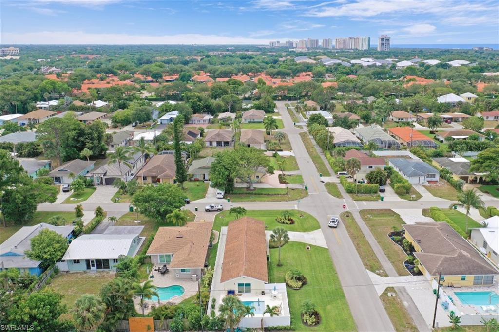 701 93rd Avenue North Naples, FL 34108 - Photo 31 of 33 an aerial view of a city