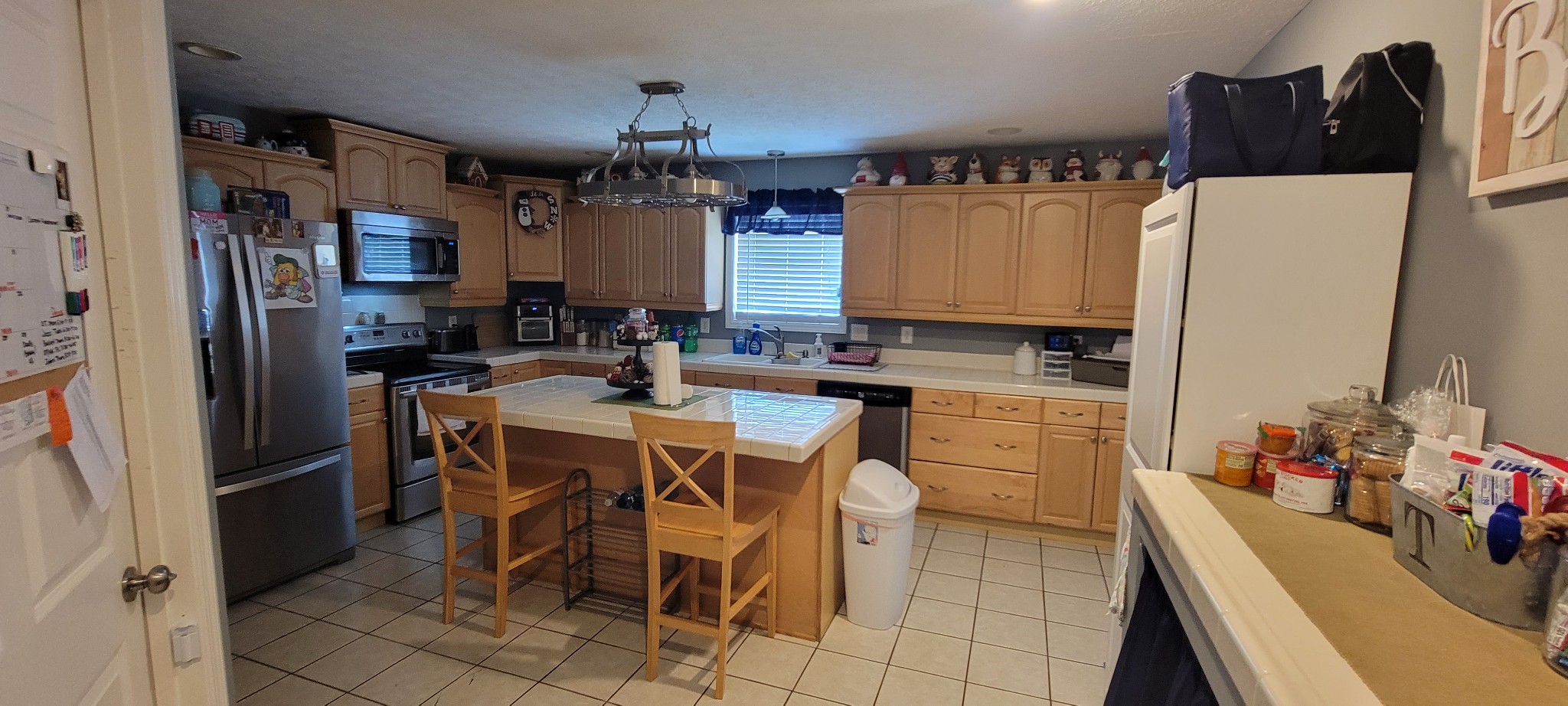 112 Faith-Rae Boulevard Morrison, TN 37357 - Photo 3 of 11 a kitchen with stainless steel appliances a sink a stove a refrigerator and a refrigerator