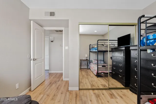 a view of a livingroom with wooden floor