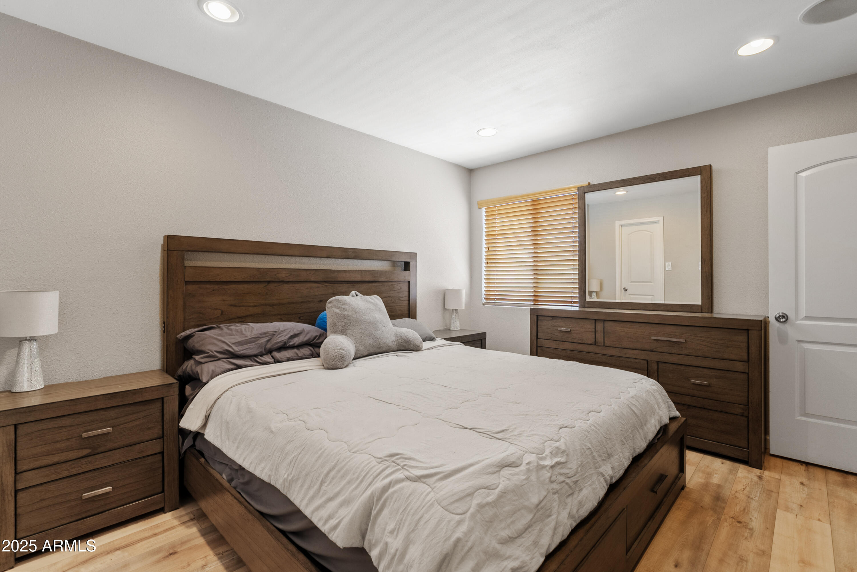 4410 North Longview Avenue, Unit 224 Phoenix, AZ 85014 - Photo 13 of 23 a bedroom with a bed and a window