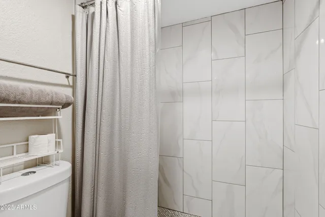 a bathroom with a sink and a shower